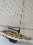 A VINTAGE POND YACHT