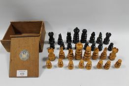 A VINTAGE TURNED WOODEN CHESS SET