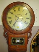 AN ANTIQUE AMERICAN WALL CLOCK