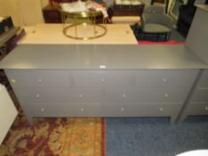 A MODERN SEVEN DRAWER CHEST W-164 CM
