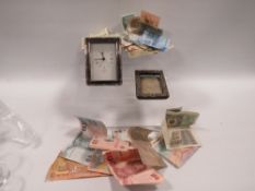 A SMALL HALLMARKED SILVER PHOTO FRAME TOGETHER WITH WHITE METAL FRAMED DESK CLOCK AND A COLLECTION