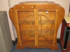 A VINTAGE WALNUT CHINA DISPLAY CABINET