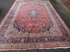 A LARGE G.H.FRITH IRAN WOOLLEN RUG - 350 X 250 CM