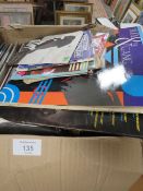 A BOX OF LP RECORDS AND 7