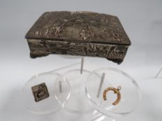 AN UNUSUAL HALLMARKED SILVER CHARM IN THE FORM OF A GEC TV TOGETHER WITH A 9CT HORSE SHOE CHARM