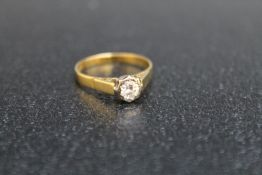 AN 18CT GOLD DIAMOND SOLITAIRE RING, in an illusion setting, approx weight 3.1g, ring size R