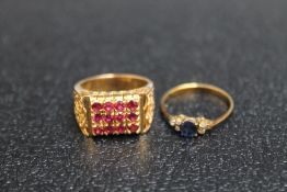 TWO 14K YELLOW METAL RINGS, one set with rubies and the other a sapphire, both ring size N, approx
