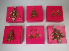 A COLLECTION OF SIX BUTLER AND WILSON CHRISTMAS THEMED JEWELLERY ITEMS, comprising four Christmas