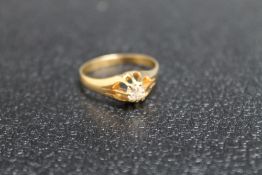 A HALLMARKED 18 CARAT GOLD DIAMOND SOLITAIRE RING, the oval diamond being in a claw setting,