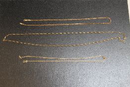 A COLLECTION OF THREE ASSORTED 9 CARAT GOLD CHAINS, approx combined weight 15.5g