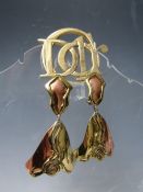 A VINTAGE PARFUMS CHRISTIAN DIOR GOLDTONE BROOCH, W 6.2 cm, together with a pair of hand crafted