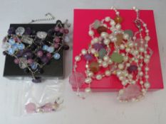 A BUTLER AND WILSON TWIN-ROW LONG LENGTH PEARL AND POLISHED AGATE BEAD NECKLACE & EARRING SET,