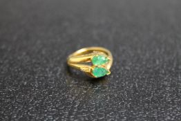 A 14K YELLOW METAL EMERALD AND DIAMOND RING, approx weight 4g, ring size K 1/2