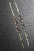 TWO GEM SET WHITE METAL BRACELETS, one set with ruby style stones, the other with sapphire style