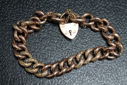 A HALLMARKED 9 CARAT GOLD BRACELET, with textured link design, approx weight 21.5g