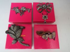 TWO BUTLER AND WILSON ROSE BROOCHES, largest L 12 cm, together with a bow brooch with dropper - L 11