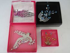 THREE LARGE BIRD THEMED BUTLER AND WILSON COSTUME BROOCHES, to include a dove style example -