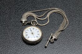 A HALLMARKED SILVER FOB WATCH, on a white metal albertina chain, Dia 3 cm