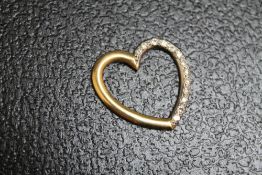 AN 18 CARAT GOLD DIAMOND SET TWO COLOUR GOLD HEART PENDANT, approx weight 4.9g, W 2.5 cm