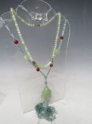 A MODERN JADE BEAD NECKLACES WITH YELLOW METAL MOUNTS, the clasp marked 9K, together with a modern