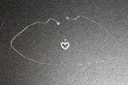 AN 18CT WHITE GOLD CHAIN WITH 925 SILVER HEART SHAPED PENDANT, chain approx weight 2.2g, L 40.5 cm