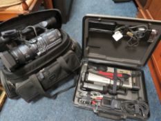 A VINTAGE CASED SONY CAMCORDER TOGETHER WITH ANOTHER