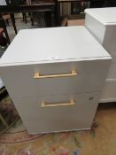 A MODERN OFFICE TWO DRAWER FILING CABINET