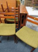 A MID CENTURY TEAK DROP LEAF TABLE AND FOUR CHAIRS