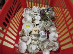 A SMALL TRAY OF MINATURE CUPS AND SAUCERS