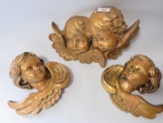 THREE GILT CHERUB WALL PLAQUES