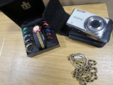 A GEORGIO BEVERLY HILLS WRIST WATCH, COSTUME JEWELLERY PENDANT AND A CAMERA