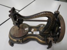A VICTORIAN JONES SWAN NECK SEWING MACHINE