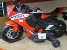 A CHILDS BATTERY RIDE ON TOY CBX 1000R WITH CHARGER - WORKING AT THE TIME OF TESTING WHEN CONSIGNED