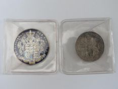 A GEORGE IV 1829 ENAMELLED COIN, together with a George II 1745 shilling (2)