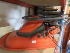 AN ELECTRIC FLYMO HOVER LAWN MOWER