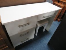 A MODERN LIGHT DESK/DRESSING TABLE WITH STOOL