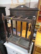 A TRADITIONAL OAK STICK STAND