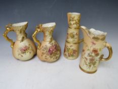 A PAIR OF ROYAL WORCESTER BLUSH IVORY STYLISED JUGS, each decorated with flowers, H 18 cm,