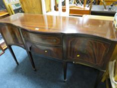 A MAHOGANY REPRODUCTION SERPENTINE SIDEBOARD