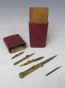 A 19TH CENTURY DRAUGHTSMAN'S LEATHER COVERED DRAWING CASE WITH IMPLEMENTS