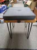 A MODERN 'HEALS OF LONDON' STOOL