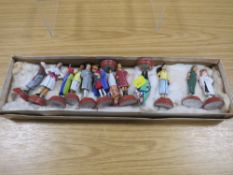 A SELECTION OF TWELVE SUB CONTINENTAL FIGURES