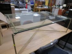 A MODERN GLASS AND METAL OFFICE TABLE 122CM X 82.5CM