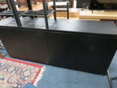 A MODERN BLACK AND METAL SIDEBOARD W- 182CM