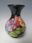 A MOORCROFT TRIAL FLORAL PATTERN GLOBULAR VASE, H 16 cm