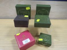 A COLLECTION OF BOXED STAFFORDSHIRE ENAMEL BOXES