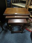 AN OAK NEST OF TABLES