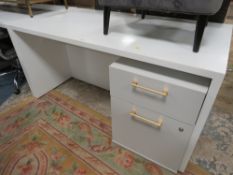 A MODERN WHITE OFFICE DESK WITH TWO DRAWER FILING CABINET W- 150CM