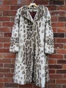 TWO VINTAGE LADIES FAUX FUR COATS, comprising an animal print Astraka example and a Tissavel jacket,