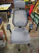 A MODERN OFFICE SWIVEL CHAIR